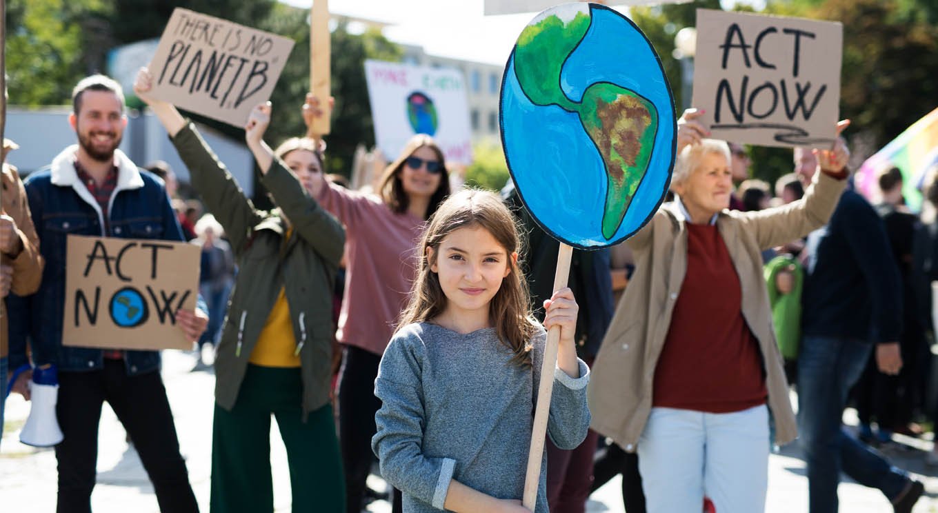 people with placards and posters on global strike
